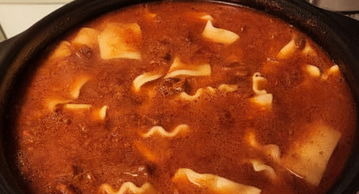 Soup made with layers of pasta, meat, cheese, and tomato sauce.