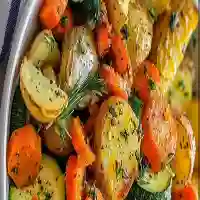 Pommes de terre, carottes et courgettes rôties à l’ail et aux herbes