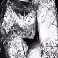 Wrap potatoes in tin foil and put in crock pot