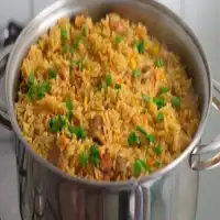 Arroz com galinhada e pequi