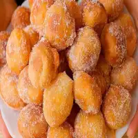 ¡Deliciosos Buñuelos de Viento! 🎉😋 Crujientes por fuera, suaves por dentro y cubiertos de azúcar