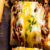 Cheesy Sloppy Joe Garlic Bread