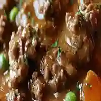 Hearty Beef and Onion Gravy atop Creamy Mashed Potatoes